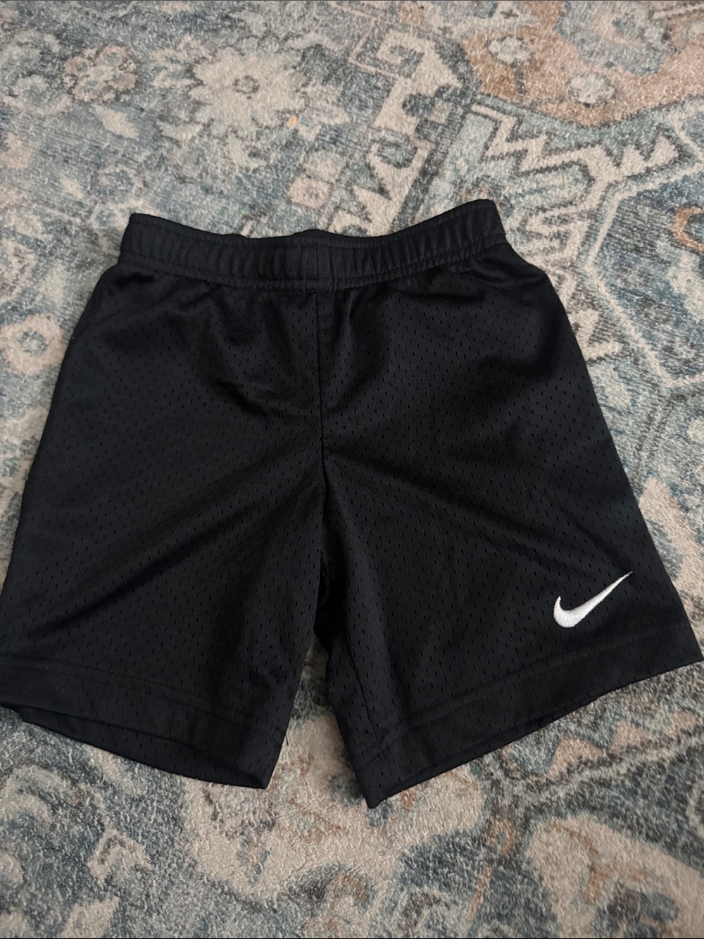 Nike Black Mesh Athletic Shorts with White Swoosh